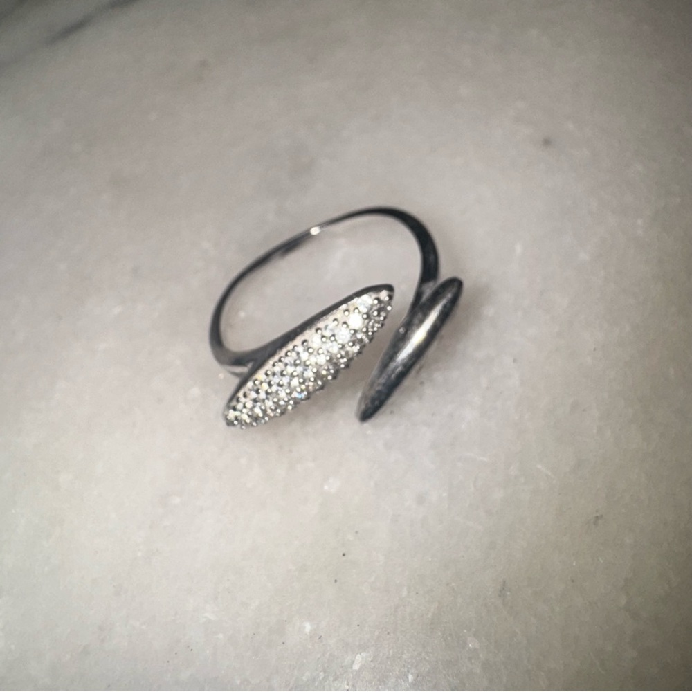 Open band ring with pave crystals